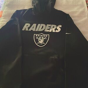 Nike Black Raiders Performance Hoody. Size X/L. Pouch pockets are zippered.